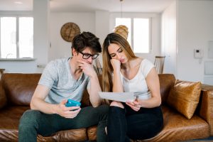 Couple with financial problems at home