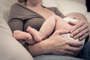 Mother holding sweet baby boy