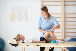 Physical therapist and a girl