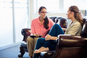 Psychologist having session with her patient